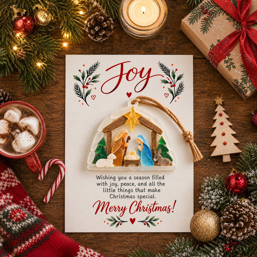 Christmas Joy Nativity ornament and greeting card on holiday tabletop